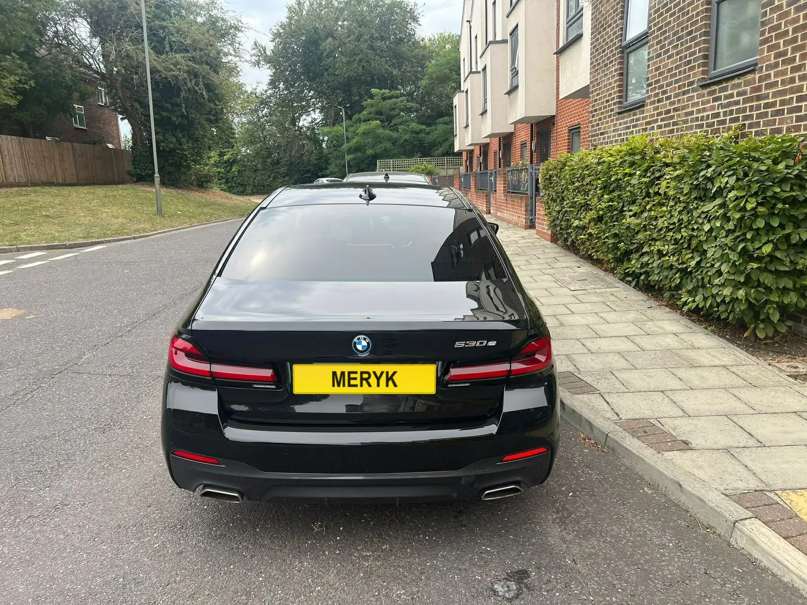 BMW 530e executive saloon with a MERYK number plate
