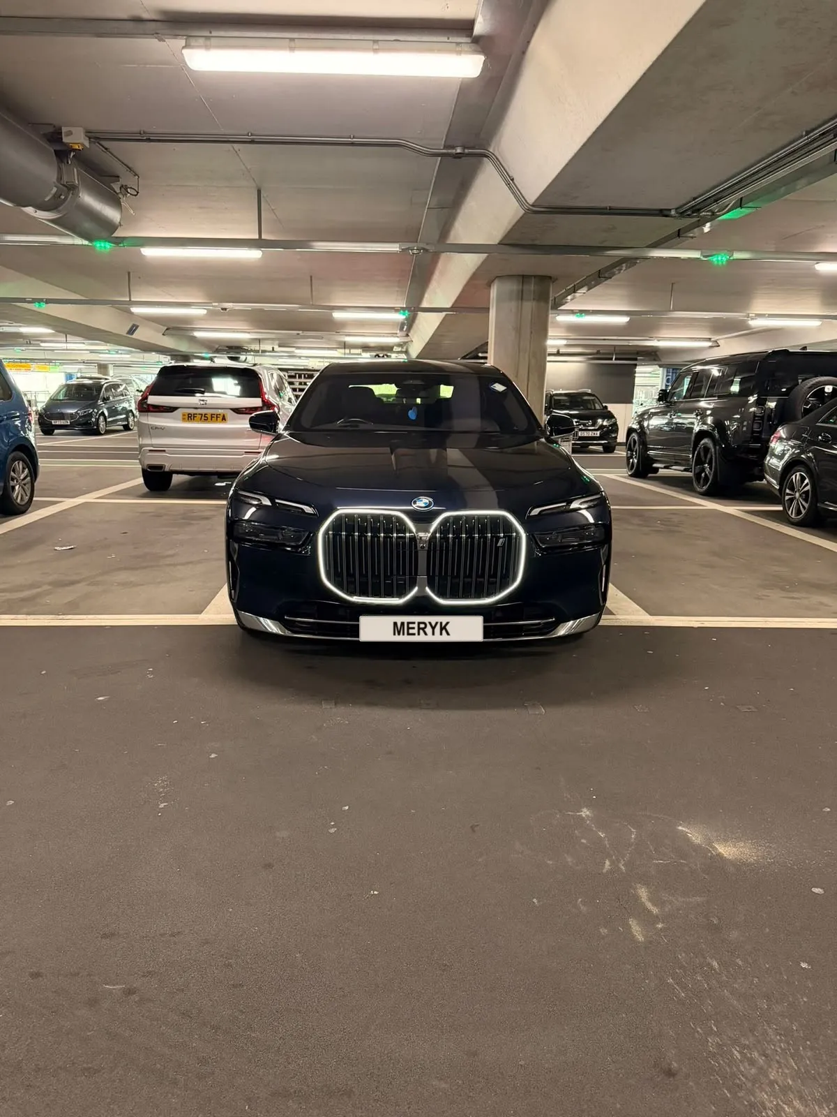 BMW i7 luxury saloon with a MERYK number plate