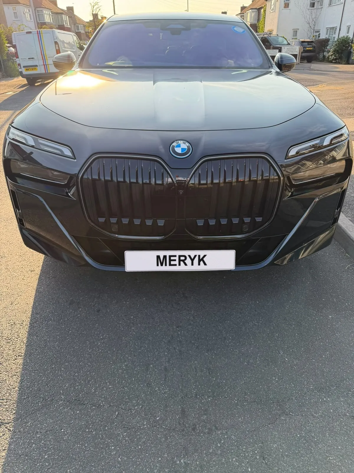 BMW i7 luxury saloon front view with a MERYK number plate